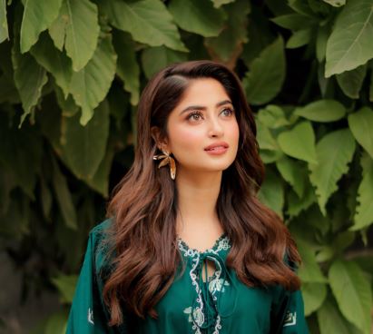 Portrait of actor Sajal Aly on an international press junket stage.
