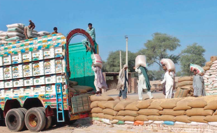 TRUCK LOADED WITH FLOUR WORKERS ON DUTY